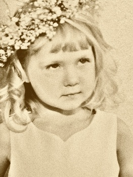 Old-fashioned photo of a flower girl